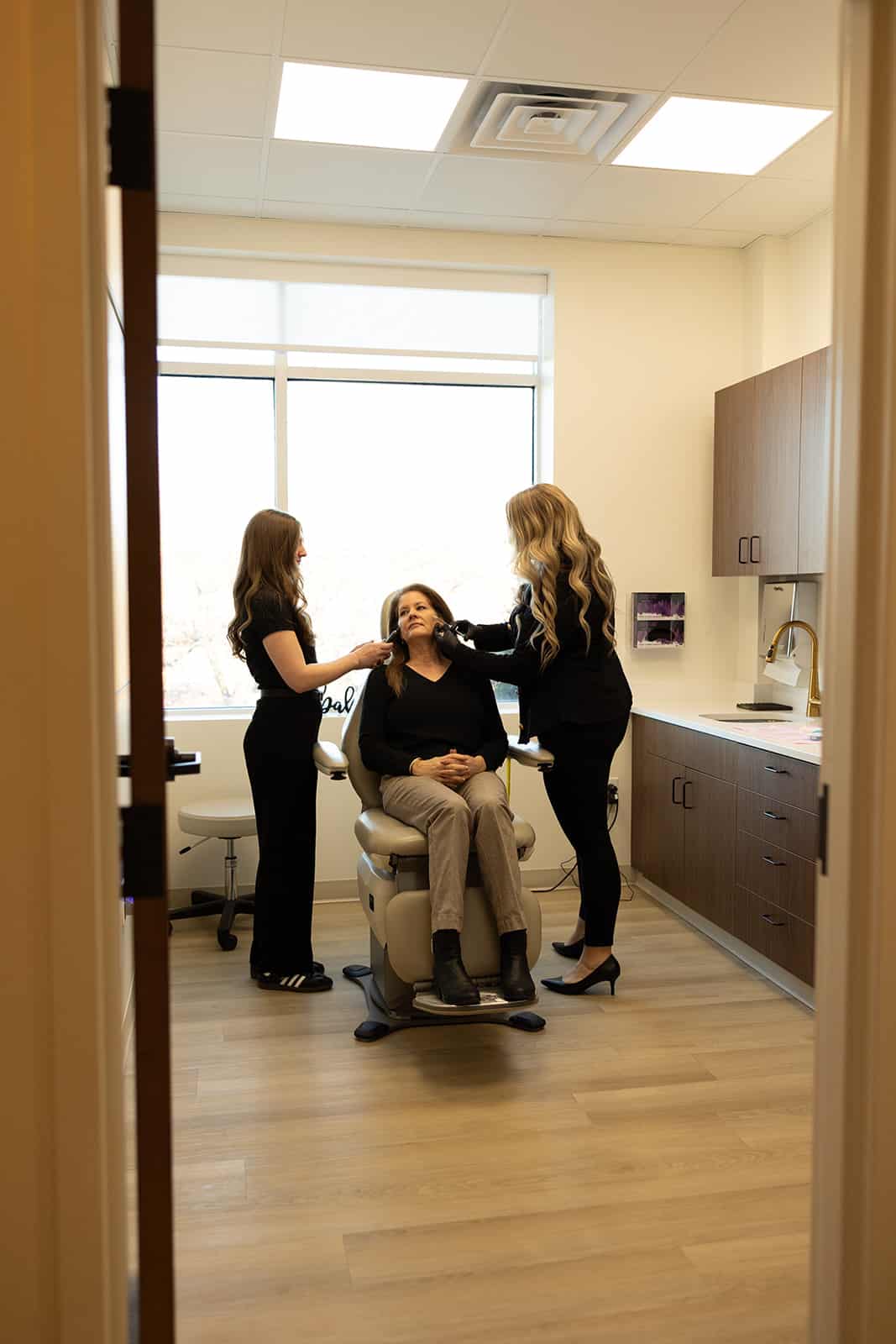 Trista Mann, RN with a patient