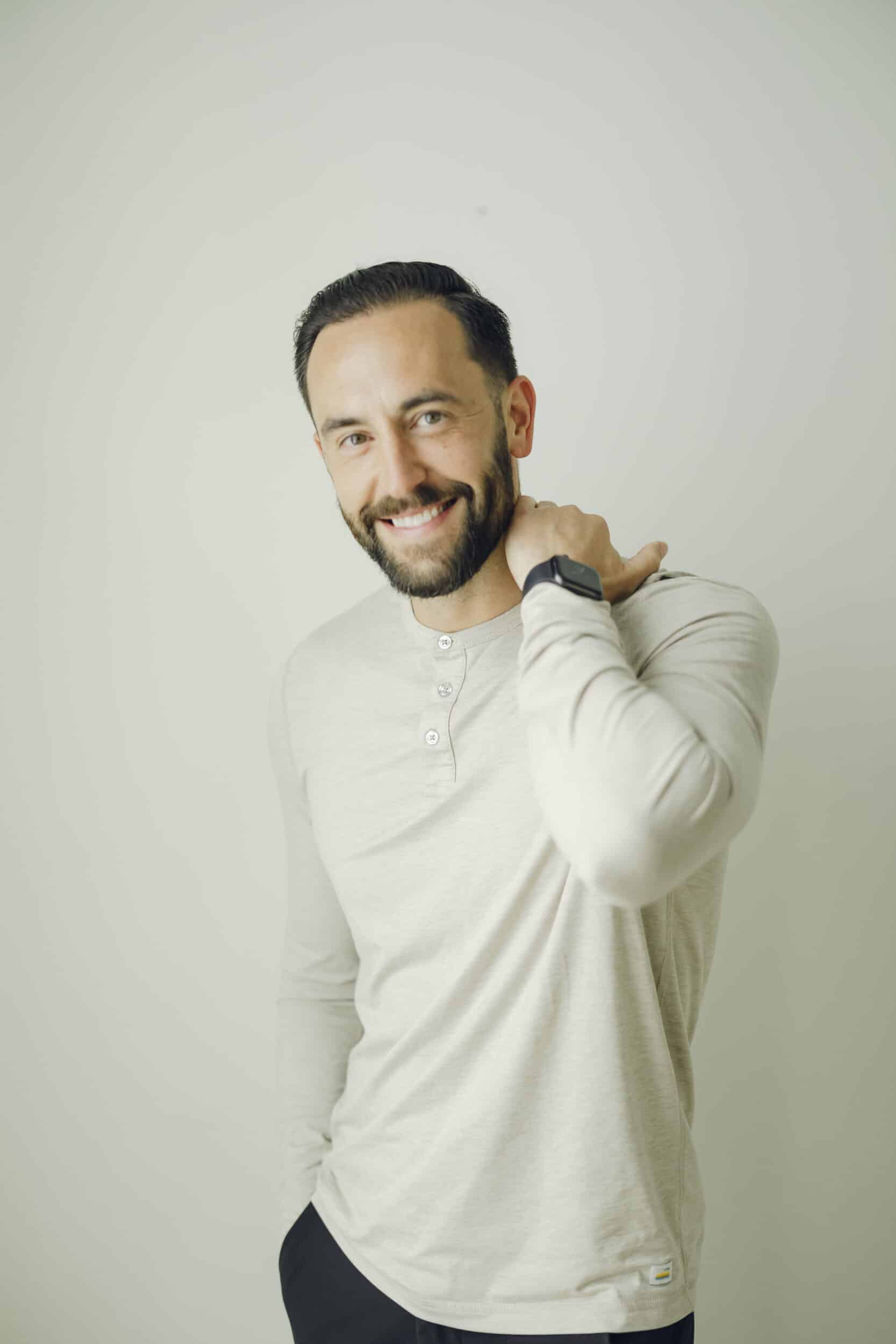 Man with a full, natural hairline, representing hair restoration at Utah Facial Plastics